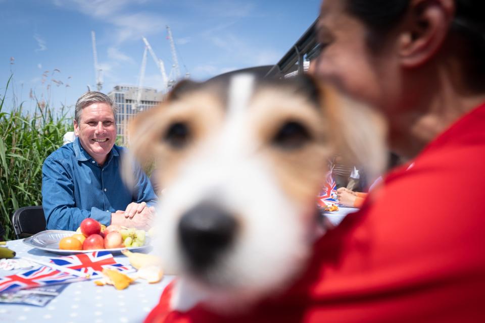 Labour leader Sir Keir Starmer sits down for lunch with young people whilst attending the London Youth Rowing Big Jubilee Lunch at London Olympic Park (PA)