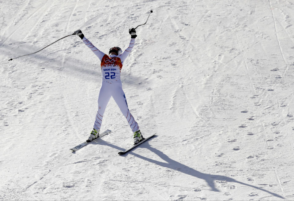 United States' Julia Mancuso celebrates after finishing the downhill portion of the women's supercombined at the Sochi 2014 Winter Olympics, Monday, Feb. 10, 2014, in Krasnaya Polyana, Russia. (AP Photo/Gero Breloer)