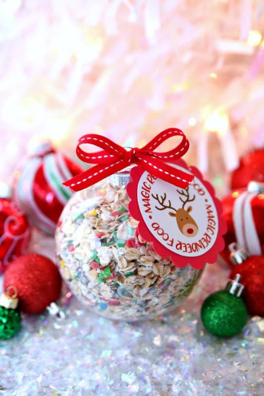 <p>Kara Creates</p><p>A beautiful way to display your reindeer food all season long before sharing on Christmas Eve.</p><p><strong>Get the recipe: <a href="https://www.happygoluckyblog.com/magic-reindeer-food-ornaments-and-free-printable/?utm_medium=social&utm_source=pinterest&utm_campaign=tailwind_tribes&utm_content=tribes&utm_term=519828890_18845880_110959" rel="nofollow noopener" target="_blank" data-ylk="slk:Magic Reindeer Food Ornaments;elm:context_link;itc:0;sec:content-canvas" class="link ">Magic Reindeer Food Ornaments</a></strong></p><p><strong>Related: <a href="https://www.yahoo.com/lifestyle/holiday-baking-north-pole-worthy-160000056.html" data-ylk="slk:80 Best Christmas Cupcakes;elm:context_link;itc:0;sec:content-canvas;outcm:mb_qualified_link;_E:mb_qualified_link;ct:story;" class="link  yahoo-link">80 Best Christmas Cupcakes</a></strong></p>