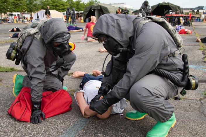 Soldiers assigned to the 140th Chemical Company, California National Guard, conduct mass casualty decontamination operations at the Navy Yard, Philadelphia, Pa., July 27, 2022. (Capt. Joe Legros)