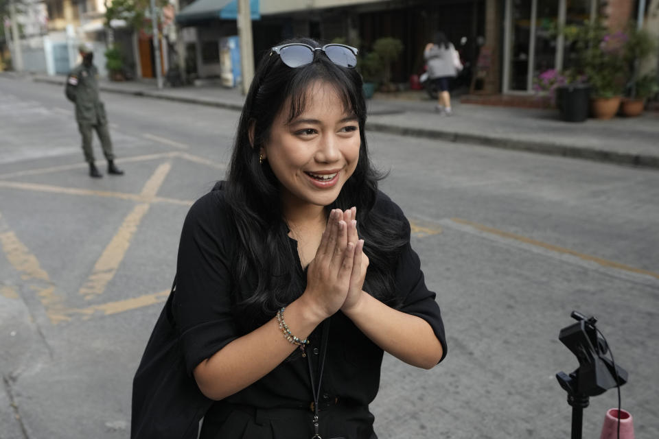 Patsaravalee Tanakitvibulpon arrives at Southern Criminal Court in Bangkok, Thailand, Wednesday, Jan. 31, 2024. A Thai court on Wednesday convicted a prominent political activist of defaming the country’s monarchy and sentenced her to a two-year suspended jail term under a controversial law that criminalizes any perceived criticism of the royal institution. (AP Photo/Sakchai Lalit)