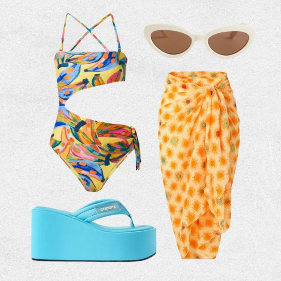 Colourful swimsuit styled with orange cover-up, white sunglasses and blue platform flip flops