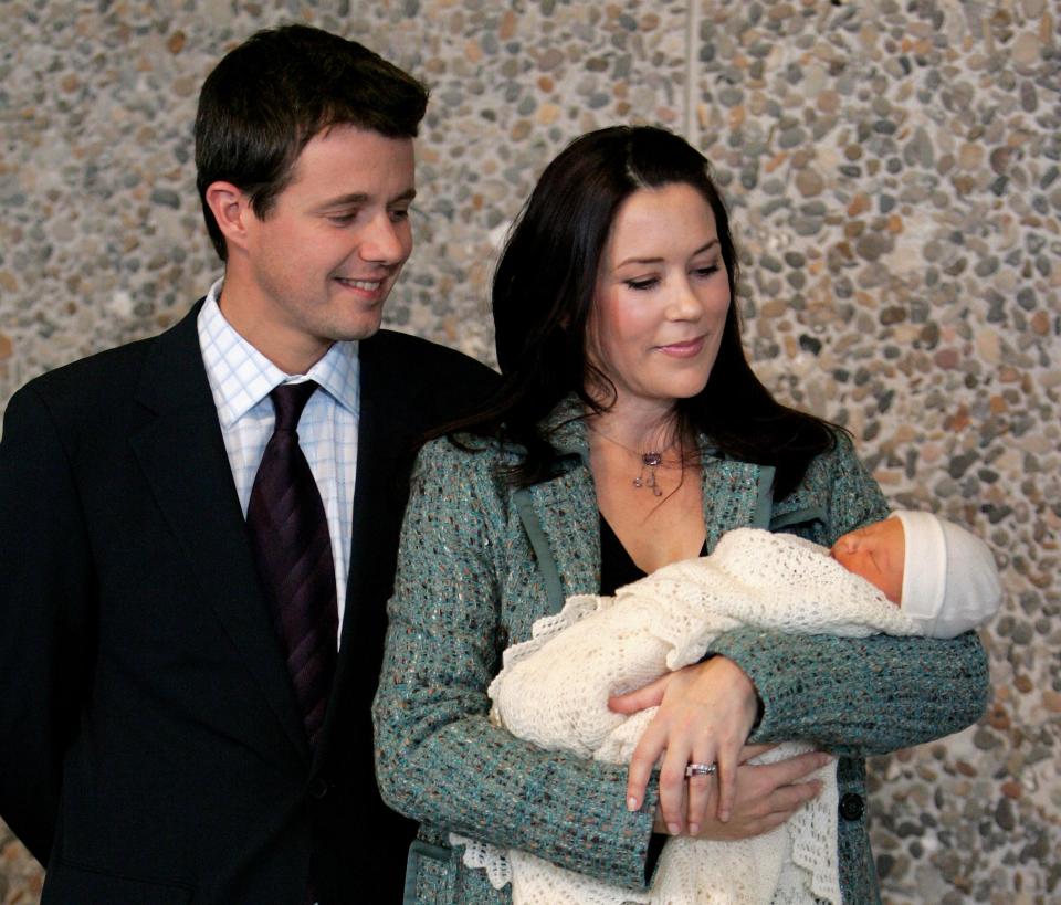 <p>Prince Frederik and Princess Mary of Denmark pose with their new baby son Prince Christian in October 2005.</p>