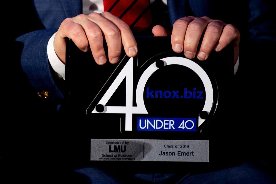 Honoree Jason Emert holds his award at Knox.biz's 40 Under 40 Gala held at the Knoxville Convention Center in Knoxville, Tenn. on Thursday, Jan. 16, 2020.