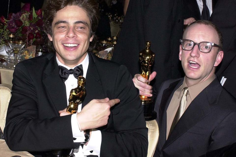'Traffic' Best Supporting Actor Oscar winner Benicio Del Toro and Best Director Oscar winner Steven Soderbergh celebrate at the Governor's Ball following the 73rd Annual Academy Awards in Los Angeles on March 25, 2001.