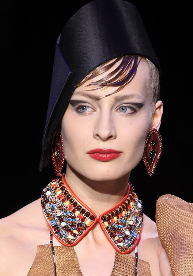 Fex hats and embellished collars added a further dramatic twist to the Armani show ©Reuters