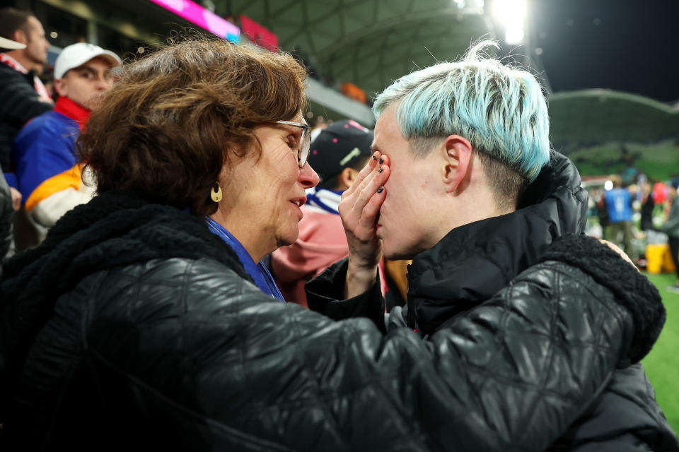 Megan Rapinoe is consoled by her mother Denise Rapinoe after the USWNT's loss to Sweden at the 2023 Women's World Cup. (Photo by Alex Grimm - FIFA/FIFA via Getty Images)