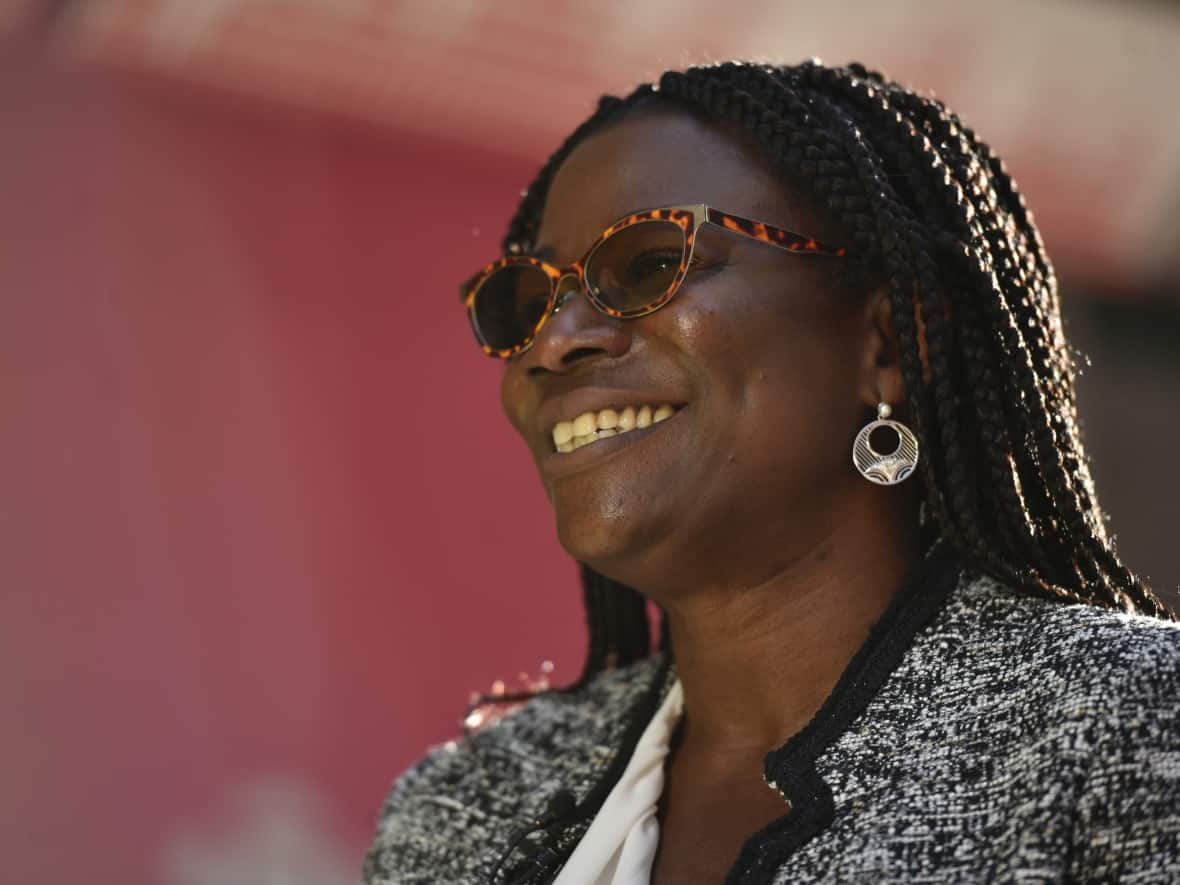 Renée Amilcar smiles for a photo Tuesday, one day after officially starting her new job as Ottawa's general manager of transit services.  (Raphael Tremblay/CBC - image credit)