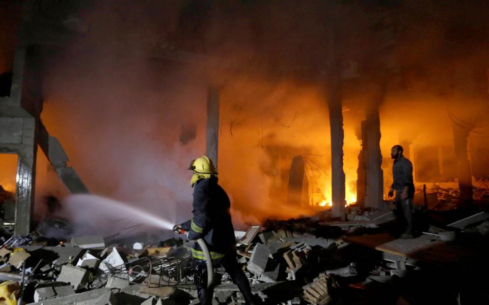 Firefighters intervene fire broke out following Israeli attack on the house of the Al-Tavil family as Israeli attacks continue