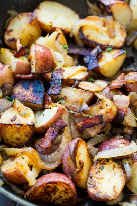 <p>Spicy Southern Kitchen</p><p>Bacon-braised red potatoes make an easy side dish and they have tons of bacon flavor and are also flavored with onion and thyme.</p><p><strong>Get the recipe: <a href="https://spicysouthernkitchen.com/bacon-braised-red-potatoes/" rel="nofollow noopener" target="_blank" data-ylk="slk:Bacon-Braised Red Potatoes;elm:context_link;itc:0;sec:content-canvas" class="link ">Bacon-Braised Red Potatoes</a></strong></p>