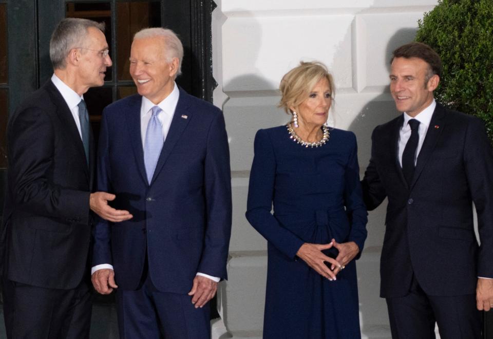 US President Joe Biden and US First Lady Jill Biden with Secretary General of NATO Jens Stoltenberg (L) and French President Emmanuel Macron (R) pose during an official arrival ceremony for NATO Allies and partners at the South Portico of the White House in Washington, DC, on July 10, 2024, on the sidelines of the NATO 75th anniversary summit. (Photo by ROBERTO SCHMIDT / AFP) (Photo by ROBERTO SCHMIDT/AFP via Getty Images)