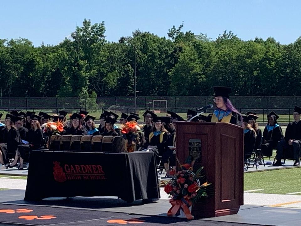 Senior Class Vice President Paige Comeau welcomes the crowd at the 147th commencement ceremony at Gardner High School on Saturday, June 4.