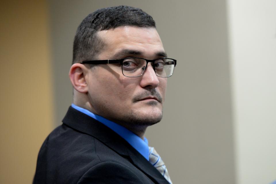 Sigfredo Garcia stands as the jury enters the courtroom during his sentencing for the 2014 murder of Florida State University law professor Dan Markel Monday, Oct. 14, 2019. 