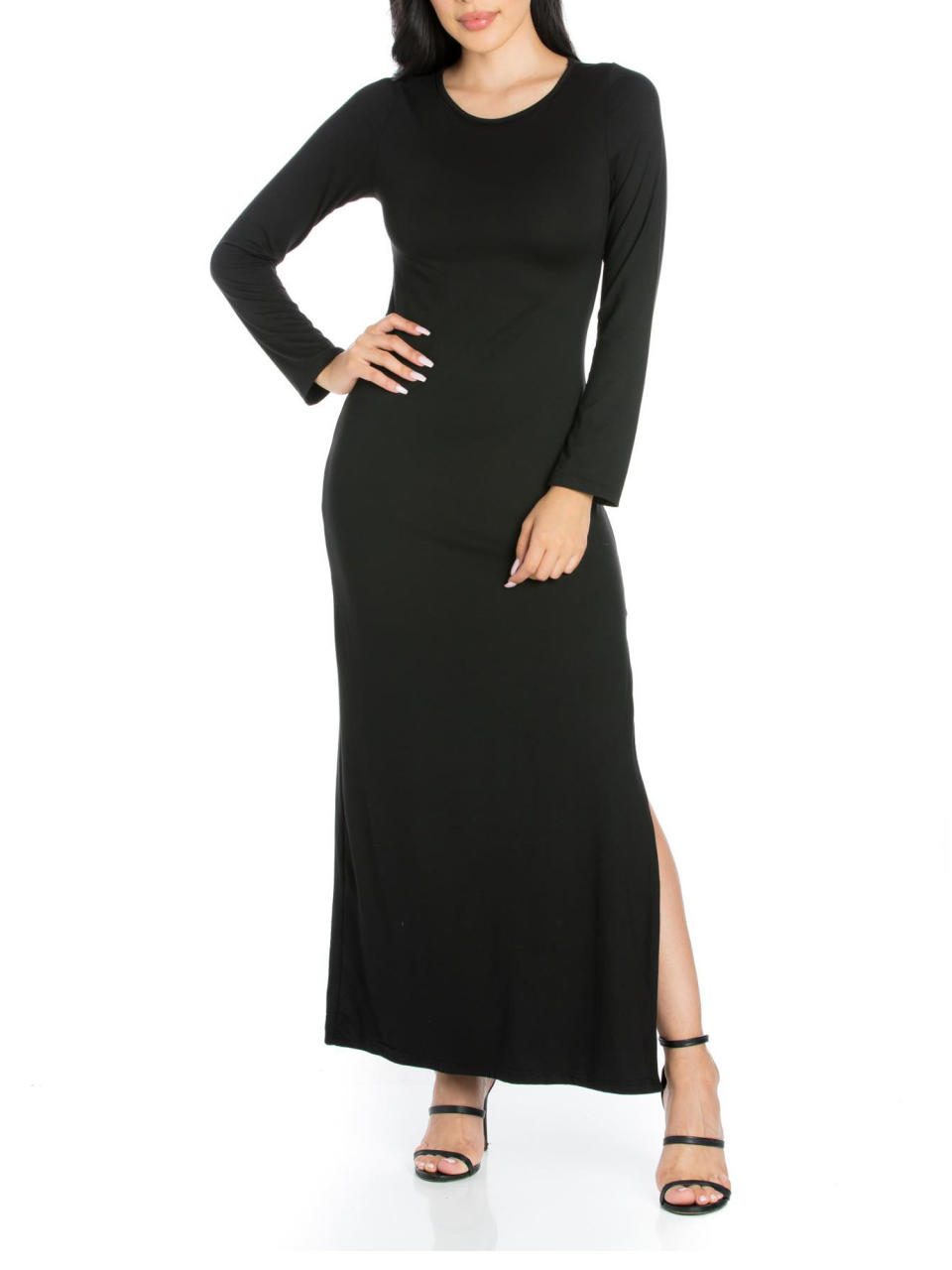Model wearing black dress with black heels