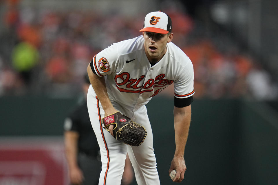 Baltimore Orioles starting pitcher John Means waits to pitch to the St. Louis Cardinals in the second inning of a baseball game, Tuesday, Sept. 12, 2023 in Baltimore. (AP Photo/Julio Cortez)