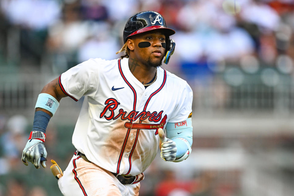 ATLANTA, GA  MAY 20:  Atlanta outfielder Ronald Acuna Jr. (13) runs to first base during the second game of a MLB doubleheader between the San Diego Padres and the Atlanta Braves on May 20th, 2024 at Truist Park in Atlanta, GA. (Photo by Rich von Biberstein/Icon Sportswire via Getty Images)