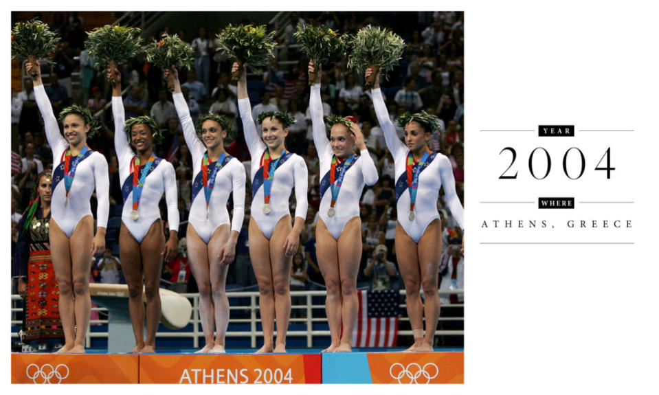 These all-white uniforms boasted red stripes on one shoulder and a thick blue stripe decorated with white stars. The U.S. women’s gymnastics team took home the silver medal that year.