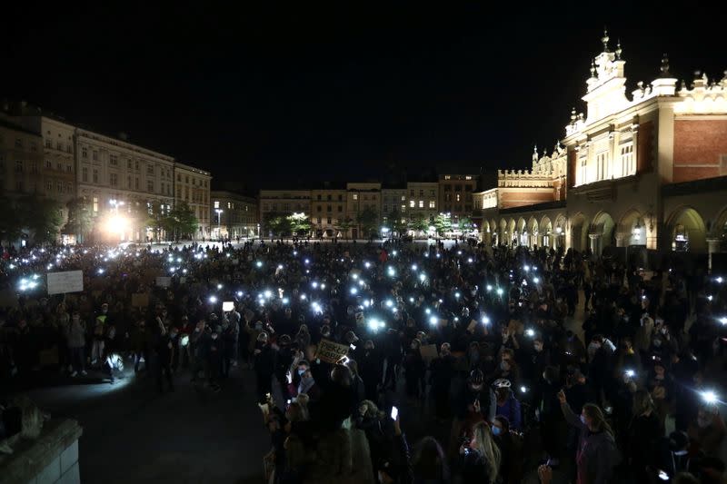 Demonstrators hold a protest against the ruling by Poland's Constitutional Tribunal that imposes a near-total ban on abortion, in Cracow