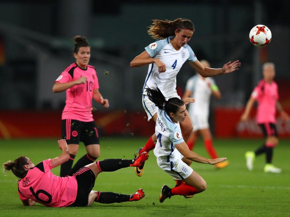 Karen Carney is brought down by Joanna Love during Wednesday's game (Getty)