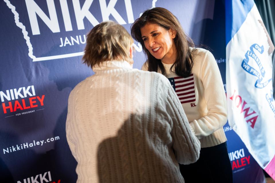 Republican presidential candidate Nikki Haley meets with voters after a town hall event Monday, Dec. 18, 2023, in Carroll.