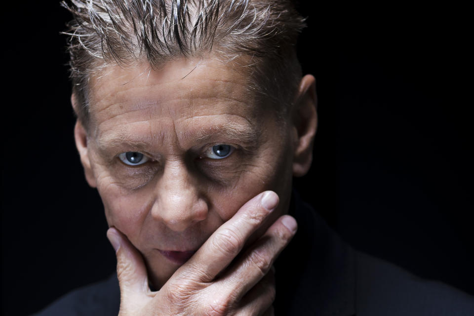 FILE - In this Sept. 4, 2014, file photo, director Andrew Niccol poses for portraits during the 71st edition of the Venice Film Festival in Venice, Italy. Hollywood news outlet Deadline reported that Niccol would write and direct the movie “They Are Us,” which was being shopped by New York-based FilmNation Entertainment to international buyers. (AP Photo/Domenico Stinellis, File)