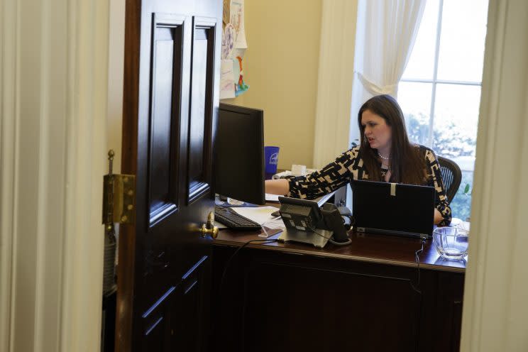 In this March 8, 2017, photo, White House deputy press secretary Sarah Huckabee Sanders works in her office at the White House in Washington. (AP Photo/Evan Vucci)