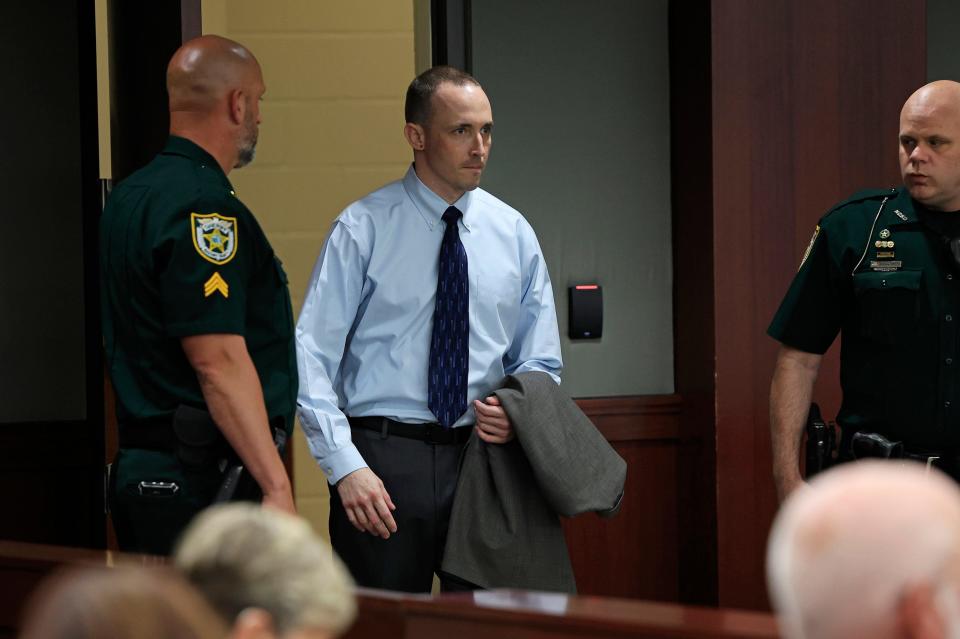 Defendant Patrick McDowell walks back into court after a lunch recess Monday for the openings of his sentencing hearings in the death of Nassau County Deputy Joshua Moyers in September 2021.