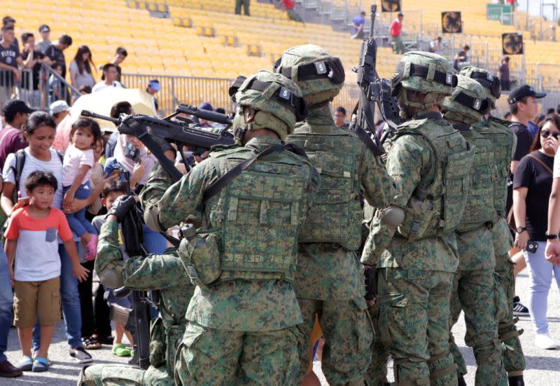 SAF national servicemen seen at the Army Open House event held at the F1 Pit Building in May. (PHOTO: Dhany Osman / Yahoo News Singapore)