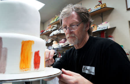 Baker Jack Phillips decorates a cake in his Masterpiece Cakeshop in Lakewood, Colorado U.S. September 21, 2017. Picture taken September 21, 2017. REUTERS/Rick Wilking