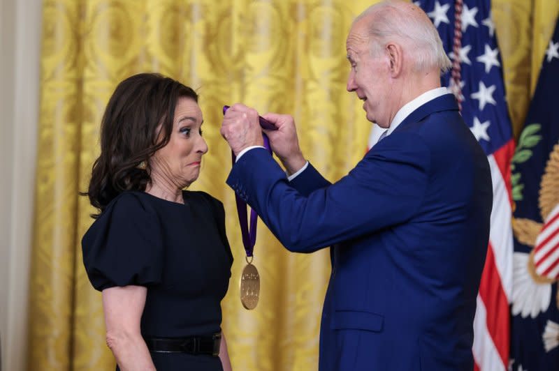 Julia Louis-Dreyfus is honored on stage by President Joe Biden during an event for the Arts and Humanities Award Ceremony in the East Room of The White House in Washington in 2023. File Photo by Oliver Contreras/UPI