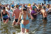 <p>A group of Polish cold water swimmers, the so-called ‘Walruses’, swim in the lake of Glebokie during the ‘Three Kings Swimming’ on the occasion of the Epiphany, in Szczecin, Poland, Jan. 6, 2018. (Photo: MARCIN BIELECKI/EPA-EFE/REX/Shutterstock) </p>