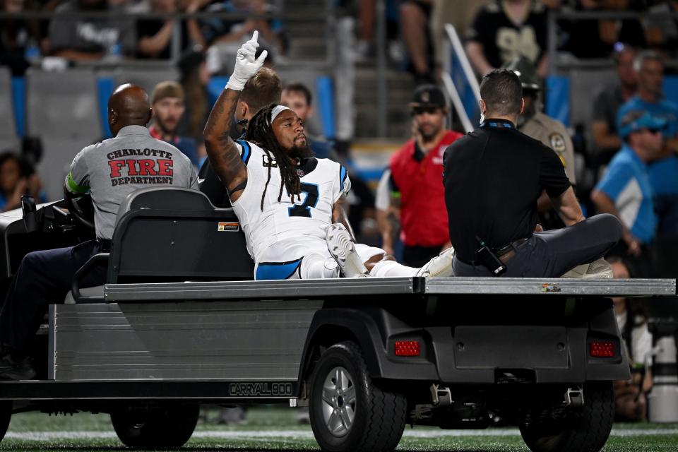 CHARLOTTE, NORTH CAROLINA - SEPTEMBER 18: Shaq Thompson #7 of the Carolina Panthers reacts as he is carted off the field against the New Orleans Saints during the first quarter in the game at Bank of America Stadium on September 18, 2023 in Charlotte, North Carolina. (Photo by Grant Halverson/Getty Images)