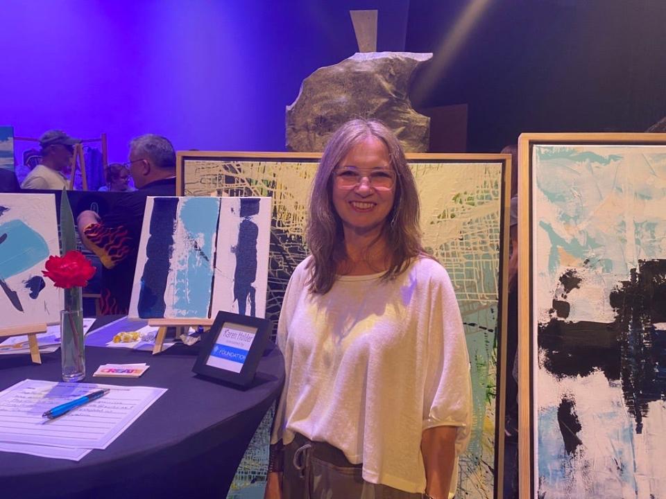 Local artist Karen Holder presents her newest series, Black and Blue, and the Arts Backstage event.