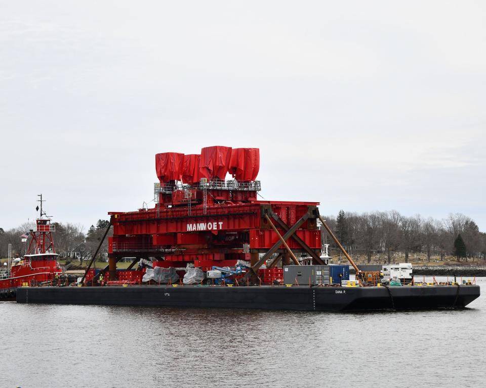 A heavy lift crane arrives at Portsmouth Naval Shipyard on Monday, April 1, 2024.