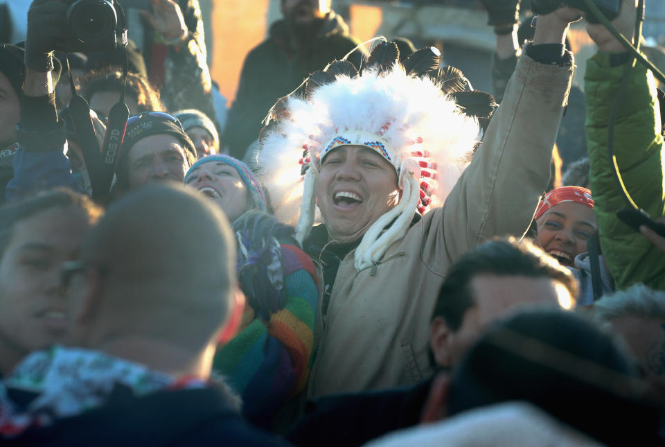 Native American and other activists celebrate after learning an easement had been denied for the Dakota Access Pipeline at Oceti Sakowin Camp on the edge of the Standing Rock Sioux Reservation on December 4, 2016 outside Cannon Ball, North Dakota. The US Army Corps of Engineers announced today that it will not grant an easement to the Dakota Access Pipeline to cross under a lake on the Sioux Tribes Standing Rock reservation, ending a months-long standoff. (Photo: Scott Olson via Getty Images)