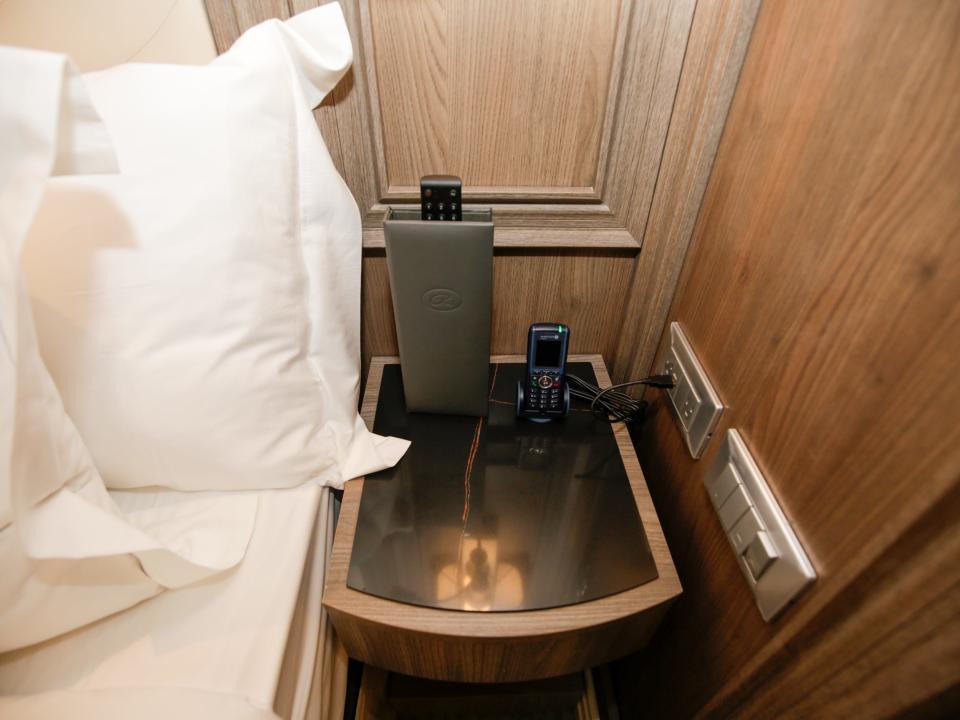 bedside table in Regent Seven Seas Grandeur's concierge suite