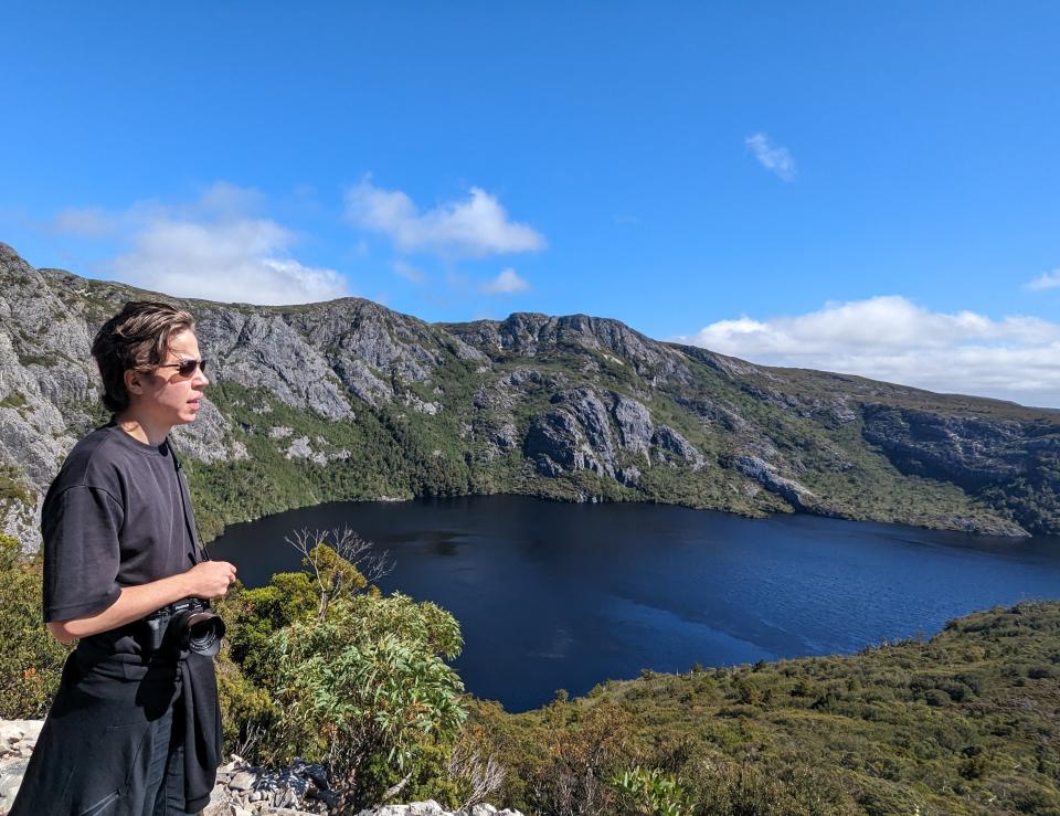 Photographer Iden Elliott at Cradle Mountain-Lake St Clair National Park in Tasmania, Australia.