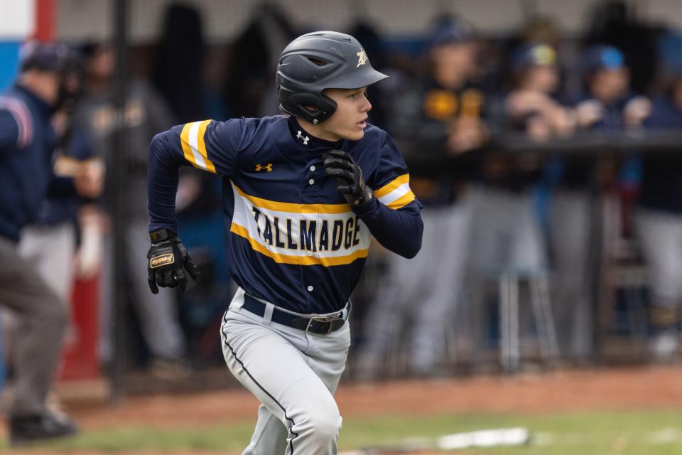 Tallmadge’s Eric Prior sprints to first after a hit against Revere, Tuesday, April 25, 2023.