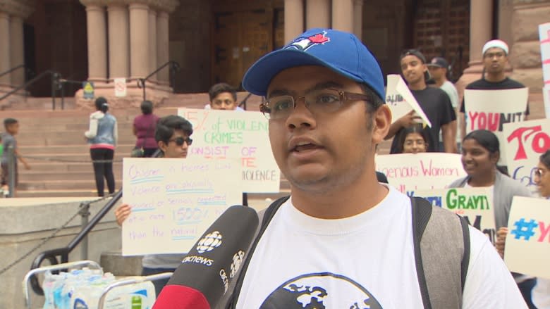 Youth march from Old City Hall to Regent Park to raise awareness about domestic abuse