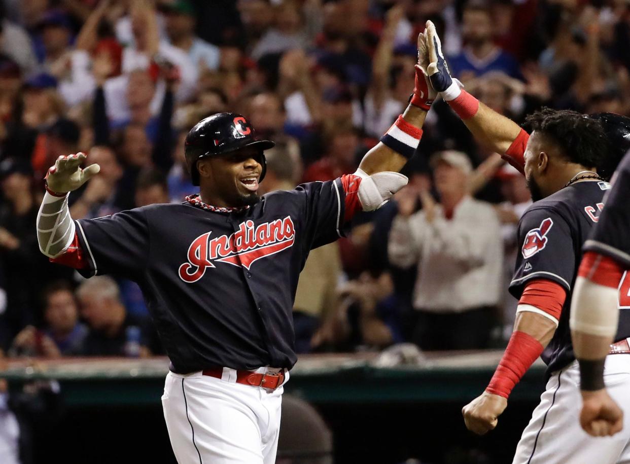 In this Nov. 2, 2016 file photo, Cleveland Indians' Rajai Davis celebrates after his two run home run against the Chicago Cubs during the eighth inning of Game 7 of the Major League Baseball World Series in Cleveland. (AP Photo/Matt Slocum, File)
(Photo: The Associated Press)