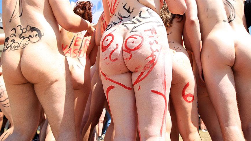 Festival goers strip off for nude fun run