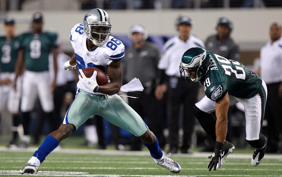 Dez Bryant #88 of the Dallas Cowboys runs the ball past Nate Allen #29 of the Philadelphia Eagles at Cowboys Stadium on December 24, 2011 in Arlington, Texas. (Photo by Ronald Martinez/Getty Images)