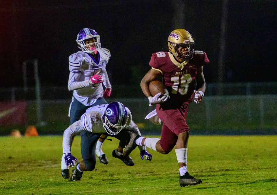 St. Augustine High School’s Devonte Lyons runs the ball to score a touchdown in his school’s game against Gainesville High School at home on Friday, October 29, 2021. 