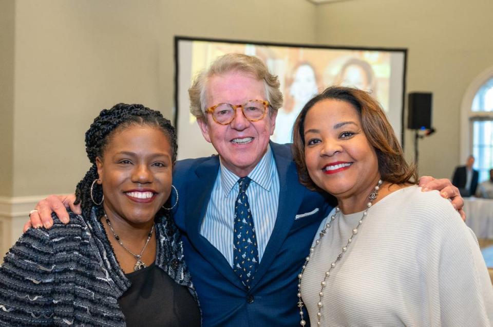 Former Aflac U.S. President Teresa White, Chairman and CEO Dan Amos and General Counsel Audrey Tillman take a photo at White’s retirement reception in March 2023.