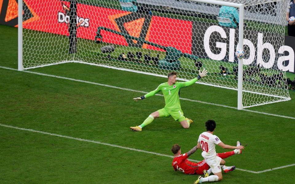 Iran's Sardar Azmoun has an attempt on goal during the FIFA World Cup Group B match at the Ahmad Bin Ali Stadium - PA