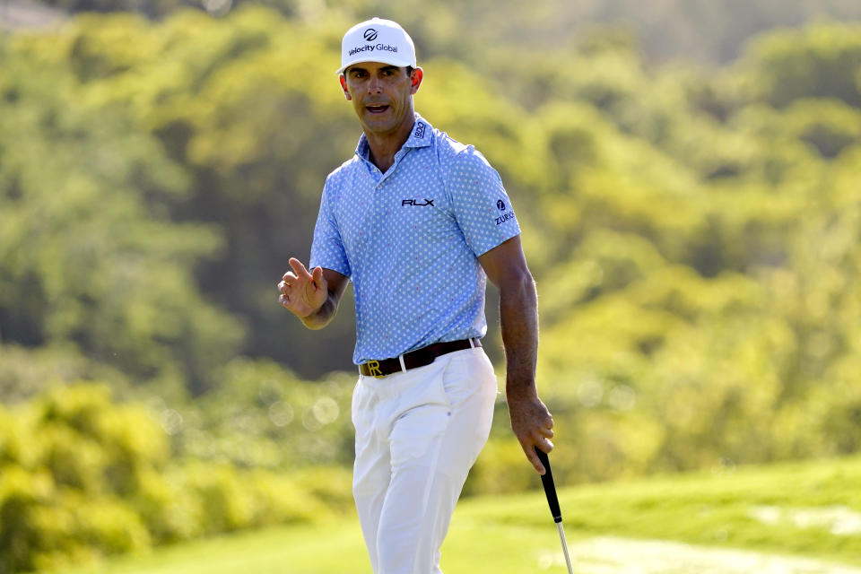 Billy Horschel acknowledges the gallery on the first green during the second round of the Tournament of Champions golf event, Friday, Jan. 7, 2022, at Kapalua Plantation Course in Kapalua, Hawaii. (AP Photo/Matt York)