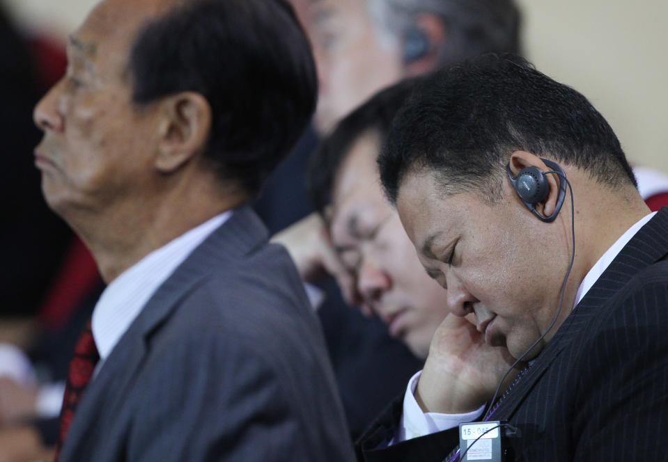 Delegates sleep during the opening morning of presentations at the APEC summit in Vladivostok, Russia, Friday, Sept. 7, 2012. (AP Photo/Ahn Young-joon)