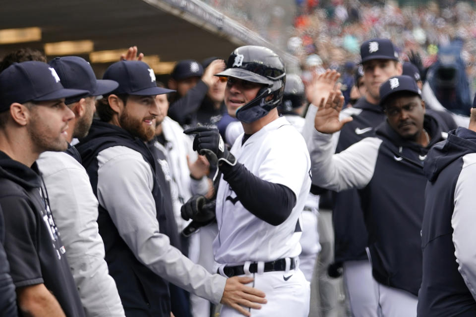 Detroit Tigers' Spencer Torkelson celebrates in the dugout after scoring against the Baltimore Orioles in the first inning during the first baseball game of a doubleheader, Saturday, April 29, 2023, in Detroit.