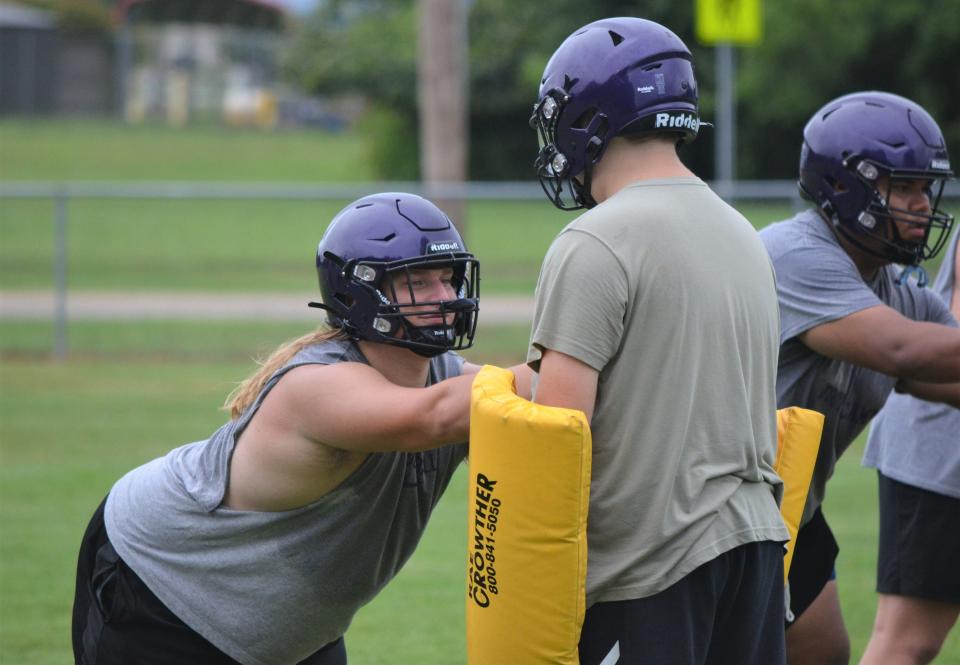 Lakeview lineman Andrew Berryhill, left, goes through a drill at practice on Tuesday. The high school football season begins the week of Aug. 25.