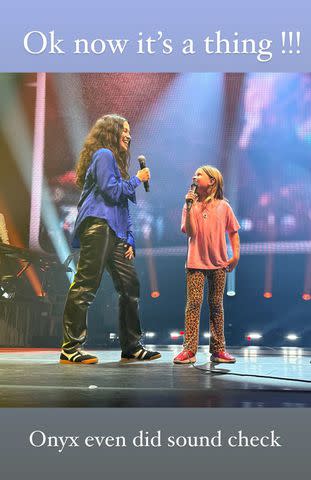 <p>Souleye/Instagram</p> Alanis Morissette and daughter on stage